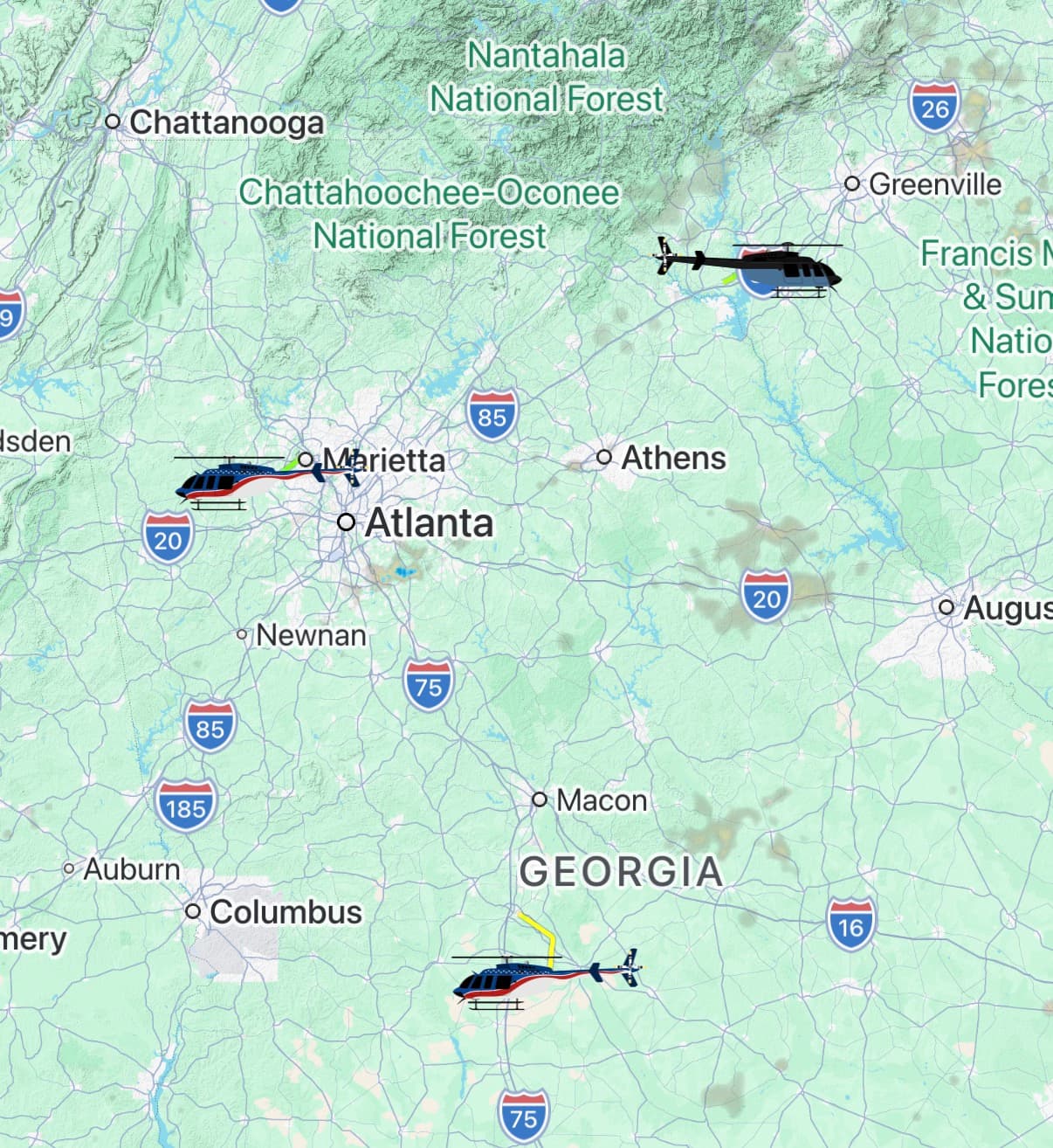 Three Bell 407 air ambulance helicopters shown over Georgia in the AirAssist app, two of them in a stars and stripes livery